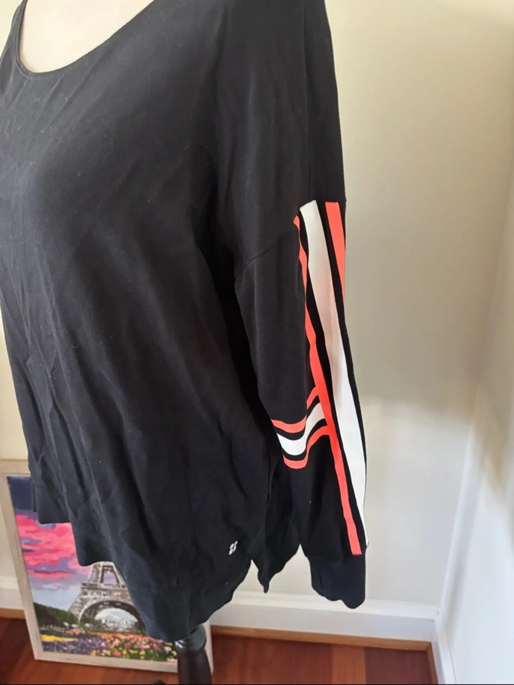 Sweaty Betty Black Long-Sleeve Top with Orange and White Sleeve Stripes - Picture 2 of 4